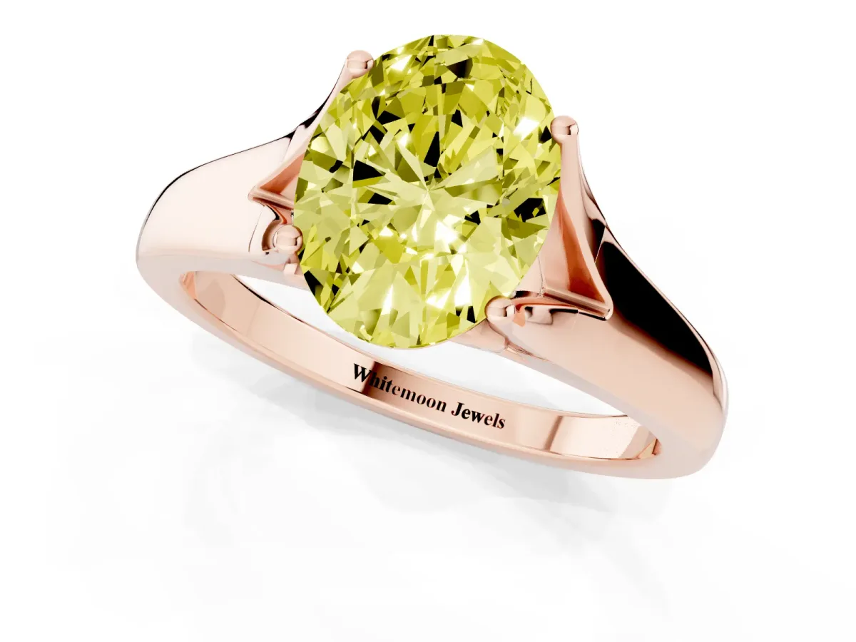 Fancy Yellow Oval Cut Solitaire Diamond Ring with Cathedral Band and Four-Prong Setting Rose gold
