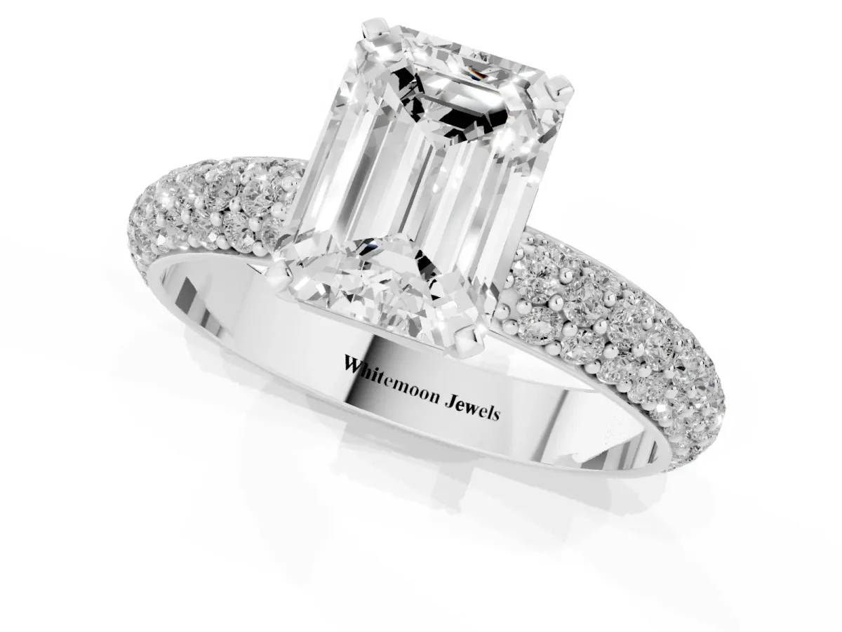 Emerald Cut Diamond Solitaire Ring with Prong Setting and Pavé Band Silver