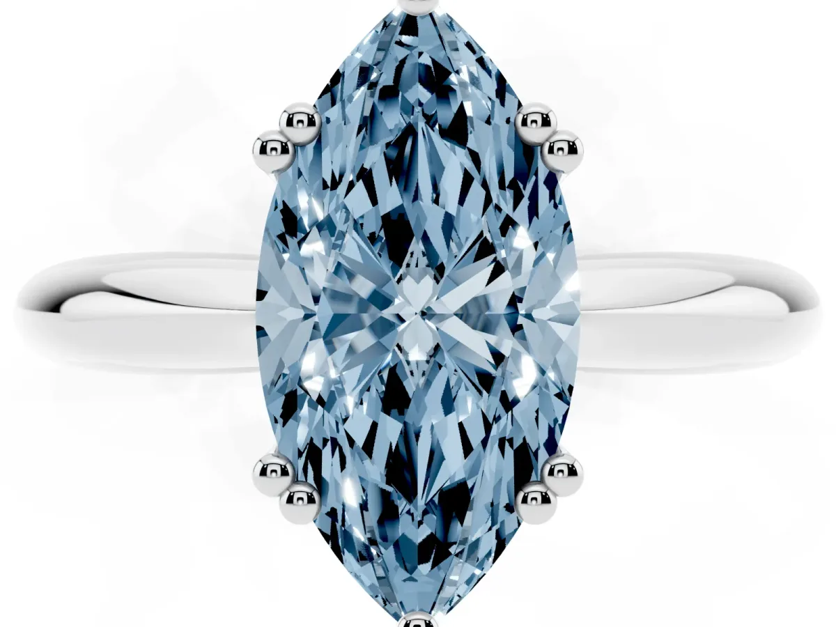 Fancy Blue Marquise Cut Cut Solitaire Engagement Ring with Tapered Band and Four-Prong Setting Silver