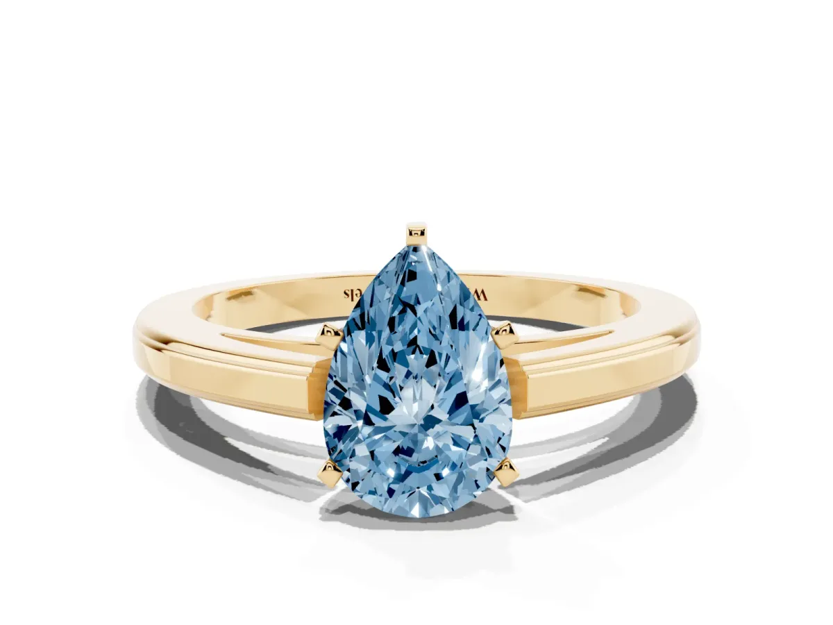 Fancy Blue Pear Cut Solitaire Diamond Ring with Four-Prong Setting and Classic Band Yellow gold