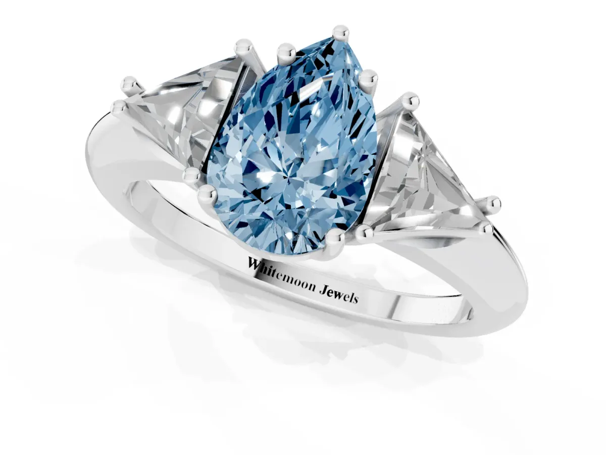 Fancy Blue Three-Stone Pear Cut Diamond Engagement Ring with Trillion Side Stones and Prong Setting Silver