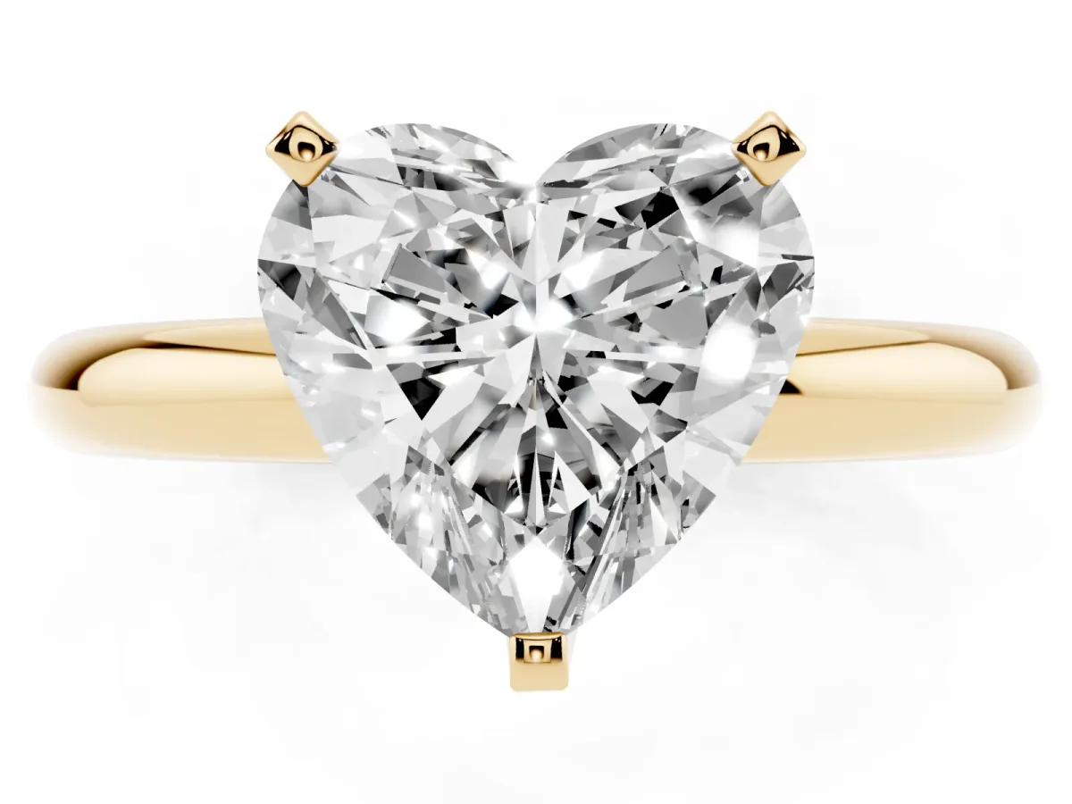 Heart Cut Diamond Solitaire Engagement Ring with Round Band and Four-Prong Setting Yellow gold