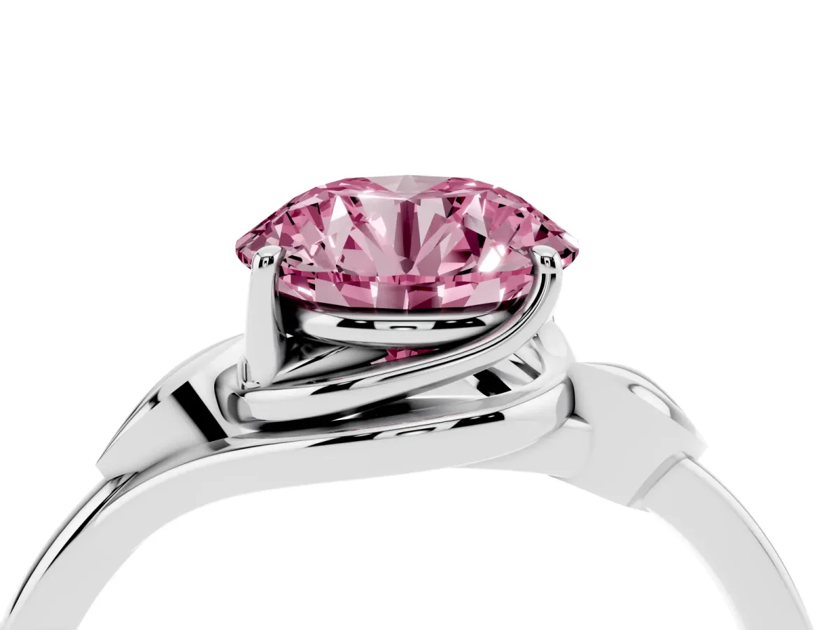 Fancy Pink Round Cut Diamond Solitaire Ring with Twist Band and Four-Prong Setting Silver