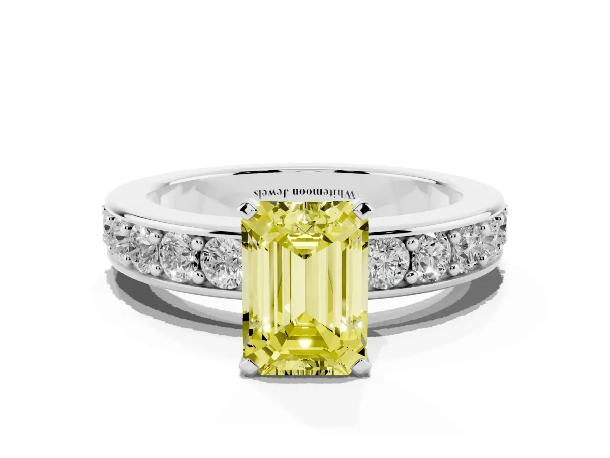 Fancy Yellow Emerald Cut Diamond Engagement Ring with Channel Set Round Band and Prong Setting Platinum