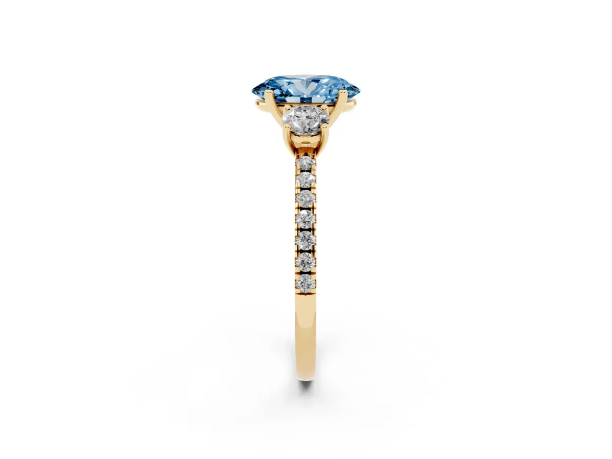 Fancy Blue Three-Stone Oval Cut Cut Diamond Pavé Band with Prong Setting Yellow gold