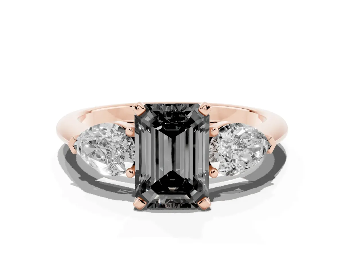 Fancy Black Three-Stone Emerald Cut Diamond Ring with Pear Side Stones and Four-Prong Setting Rose gold