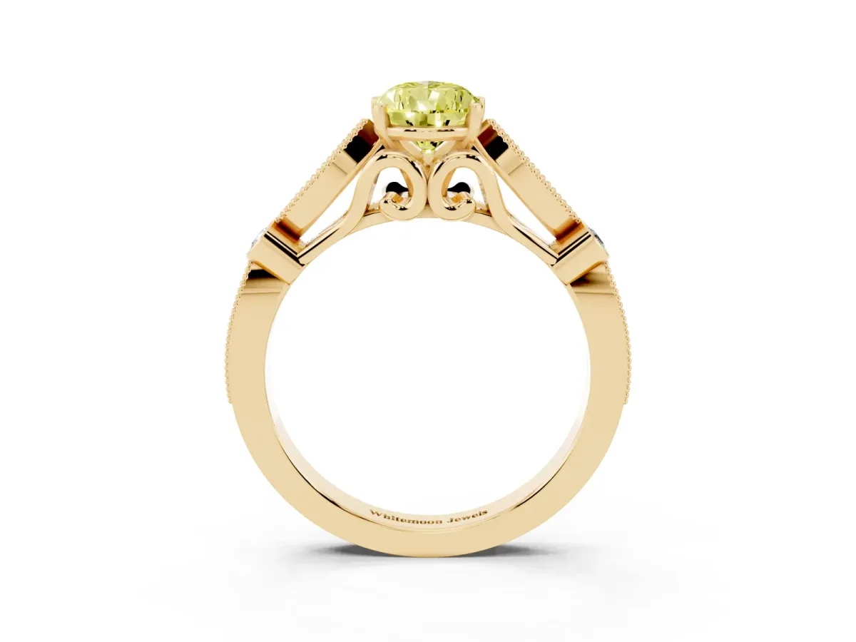 Fancy Yellow Pear Cut Cut Diamond with Milgrain Marquise and Bezel Accents on a Solitaire Band with Prong Setting Yellow gold