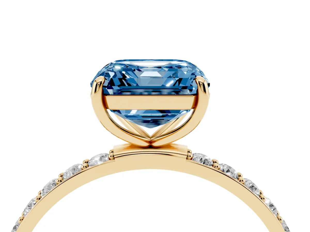 Fancy Blue Asscher Cut Diamond Solitaire Ring with Round Pavé Shoulders and Prong Setting Yellow gold