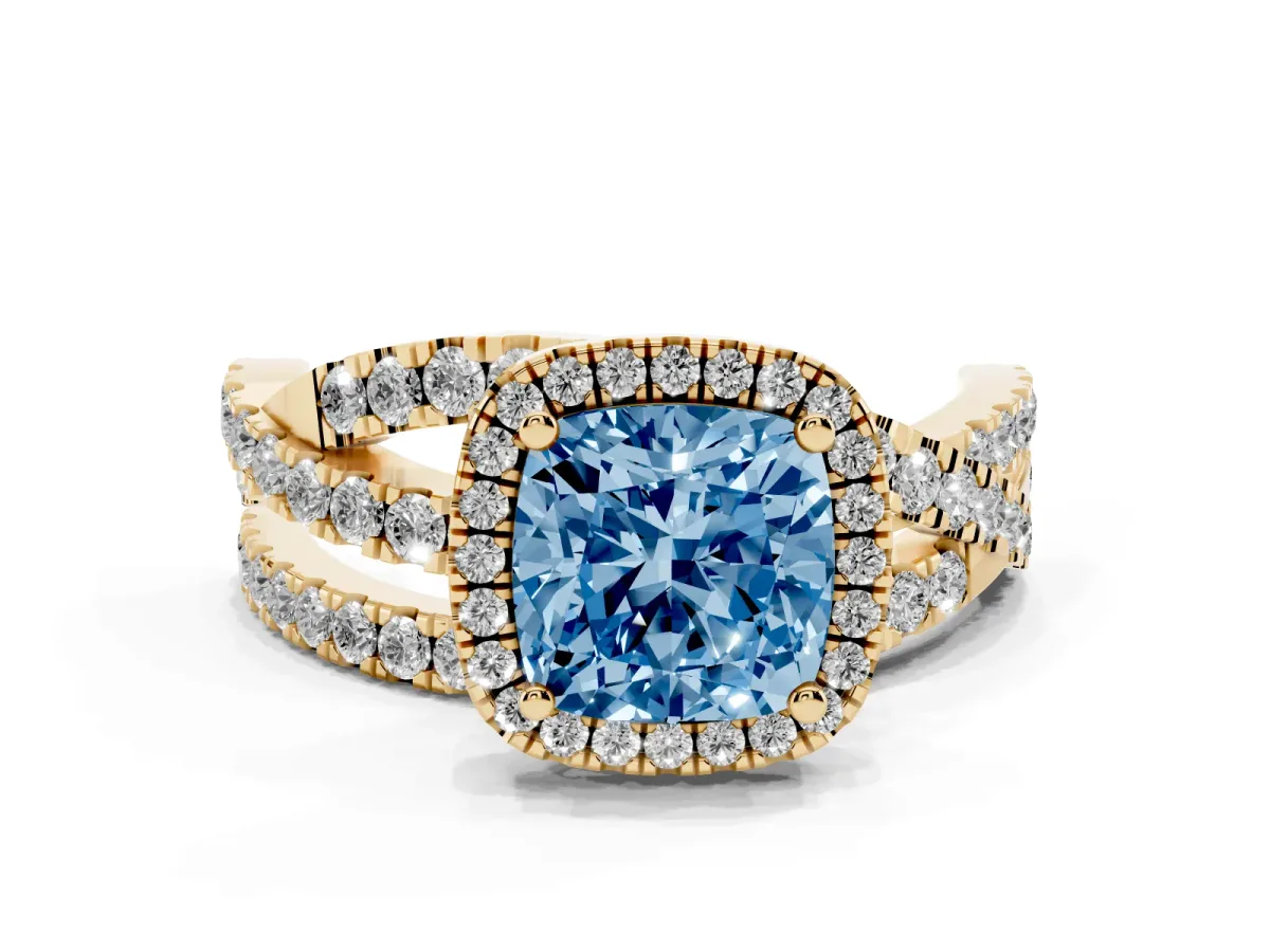 Fancy Blue Cushion Cut Diamond Halo Ring with Round Split Shank and Prong Setting Yellow gold
