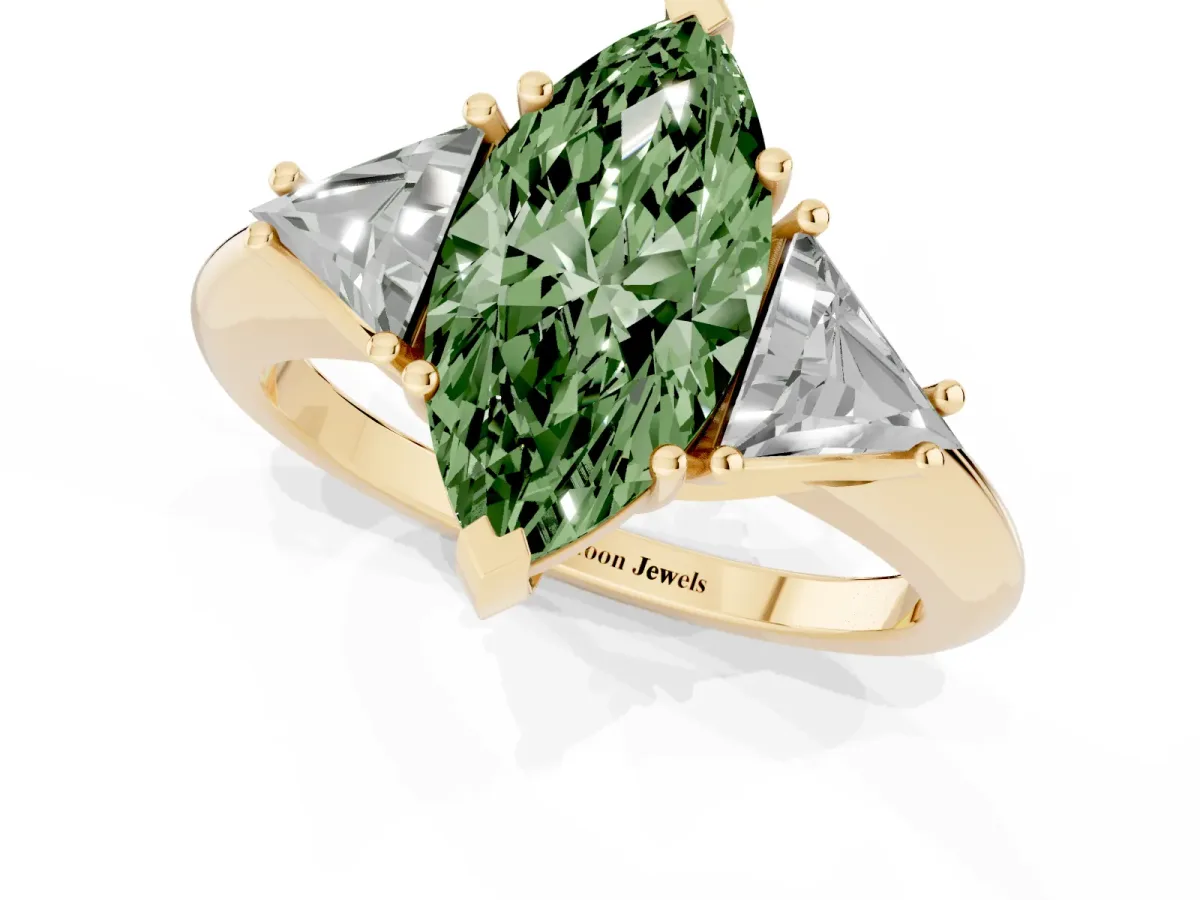 Fancy Green Three-Stone Marquise Cut Diamond Engagement Ring with Trillion Side Stones and Prong Setting Yellow gold