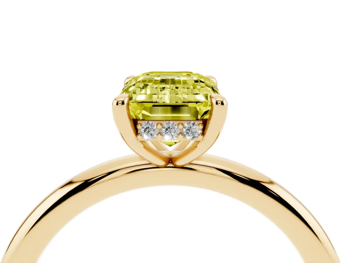 Fancy Yellow Emerald Cut Diamond Solitaire Ring with Thin Band and Four-Prong Setting Yellow gold