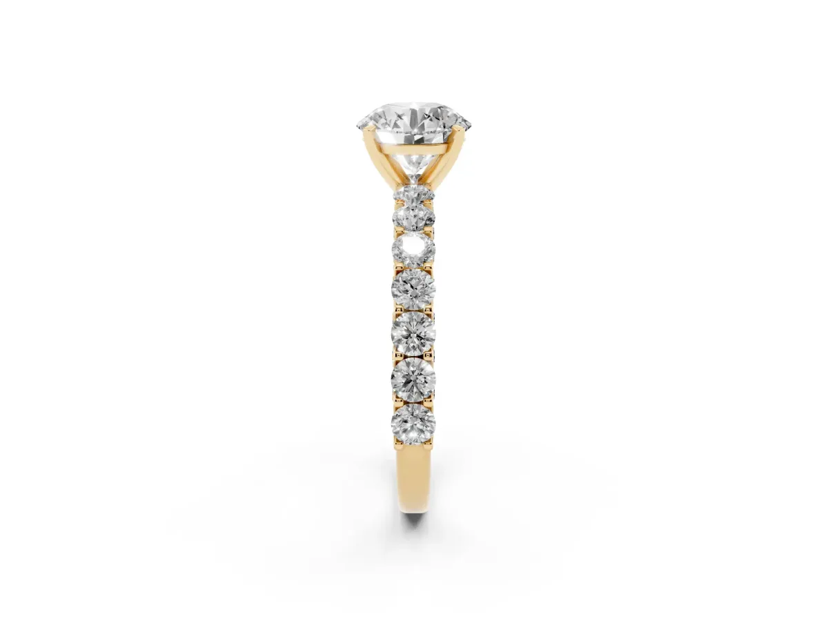 Round Cut Diamond Solitaire Ring with Shared Prong Pavé Band and Four-Prong Setting Yellow gold