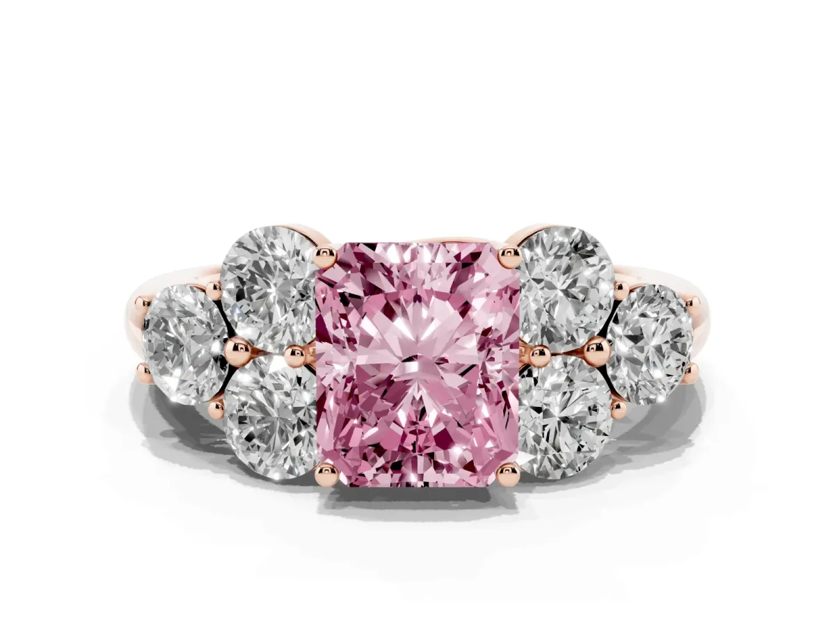 Fancy Pink Radiant Cut Cut Diamond Cluster Ring with Round Accent Stones and Prong Setting on a Classic Band Rose gold