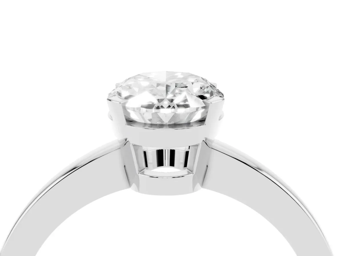 Oval Cut Cut Solitaire Ring with Four-Prong Setting and Classic Band Silver