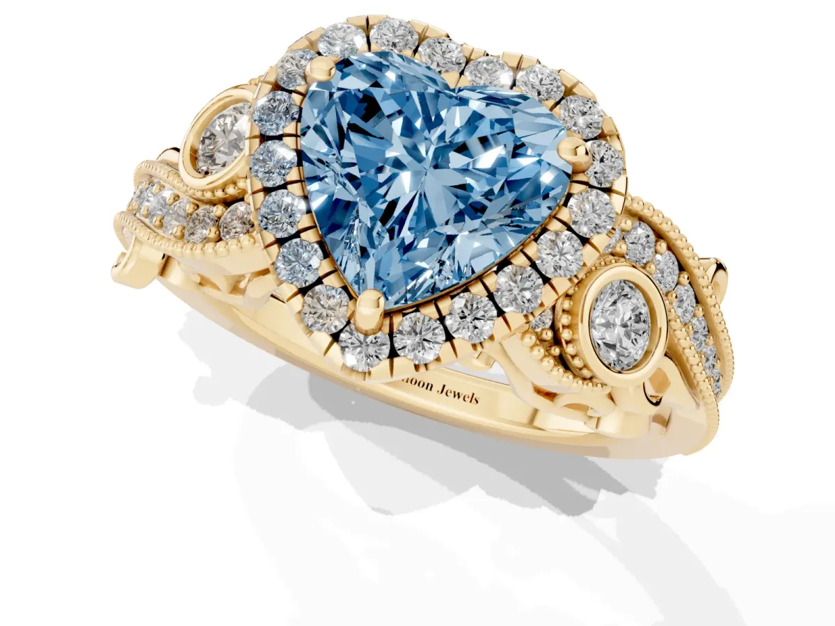 Fancy Blue Heart Cut Diamond Halo Ring with Milgrain Pavé Band and Four-Prong Setting Yellow gold