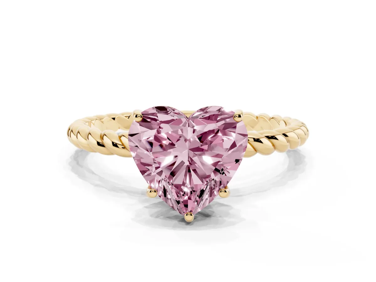 Fancy Pink Heart Cut Solitaire Twist Band Ring with Four-Prong Setting Yellow gold