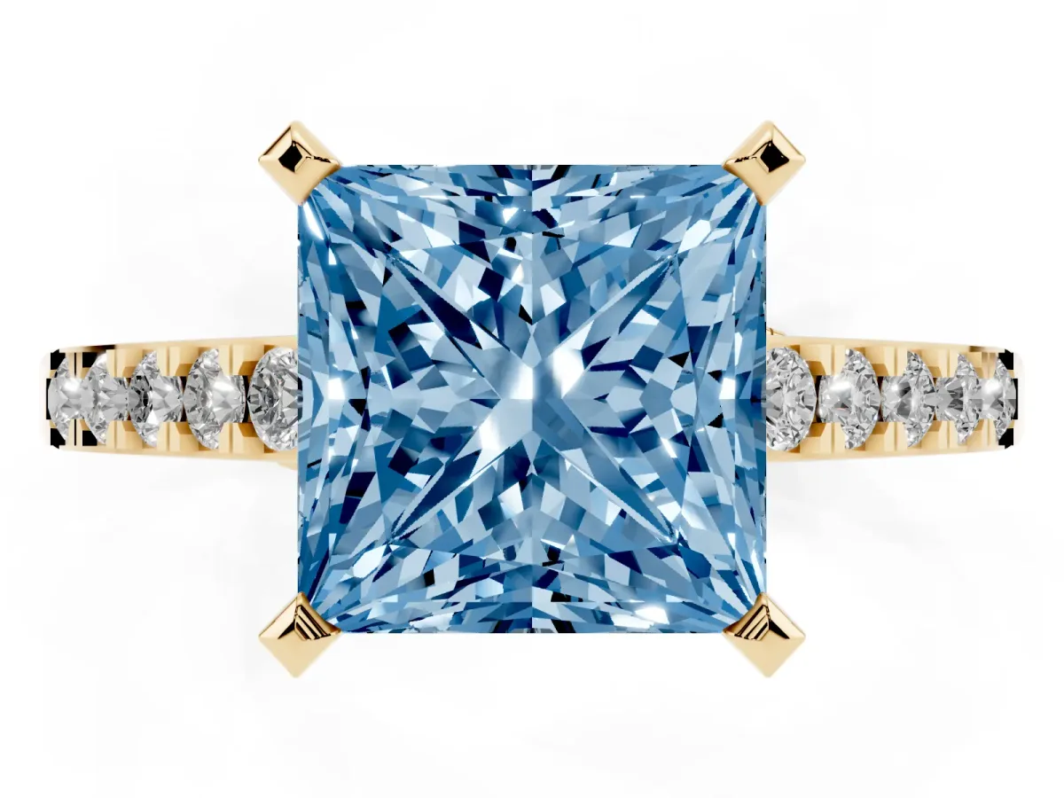 Fancy Blue Princess Cut Diamond Solitaire Ring with Crossover Gallery and Round Pavé Band Yellow gold