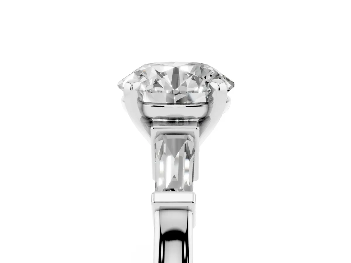 Round Cut Cut Diamond Solitaire Ring with Tapered Baguette Accents and Four-Prong Setting White gold