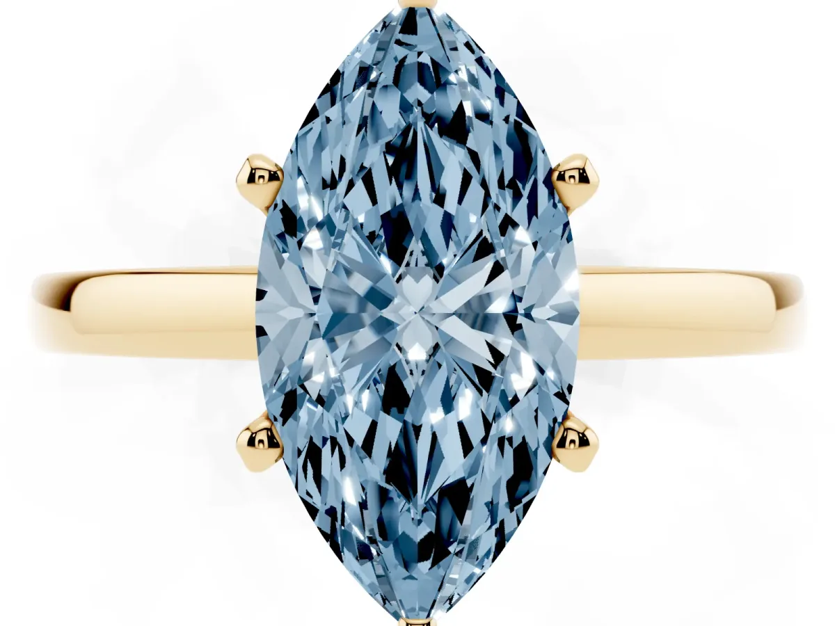 Fancy Blue Marquise Cut Solitaire Diamond Engagement Ring with Four-Prong Setting on a Classic Band Yellow gold
