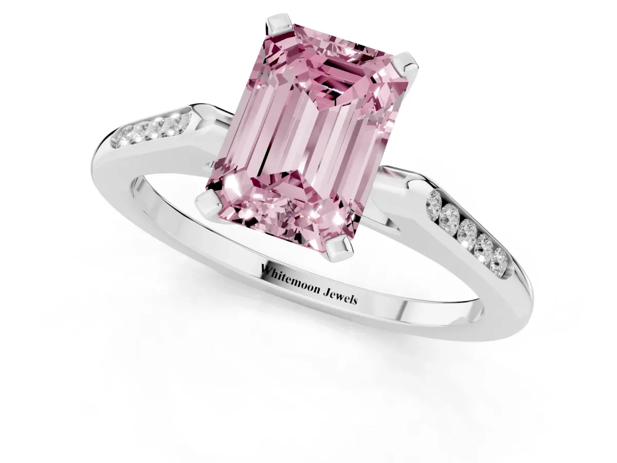Fancy Pink Emerald Cut Diamond Solitaire Ring with Channel Set Round Band and Prong Setting Silver