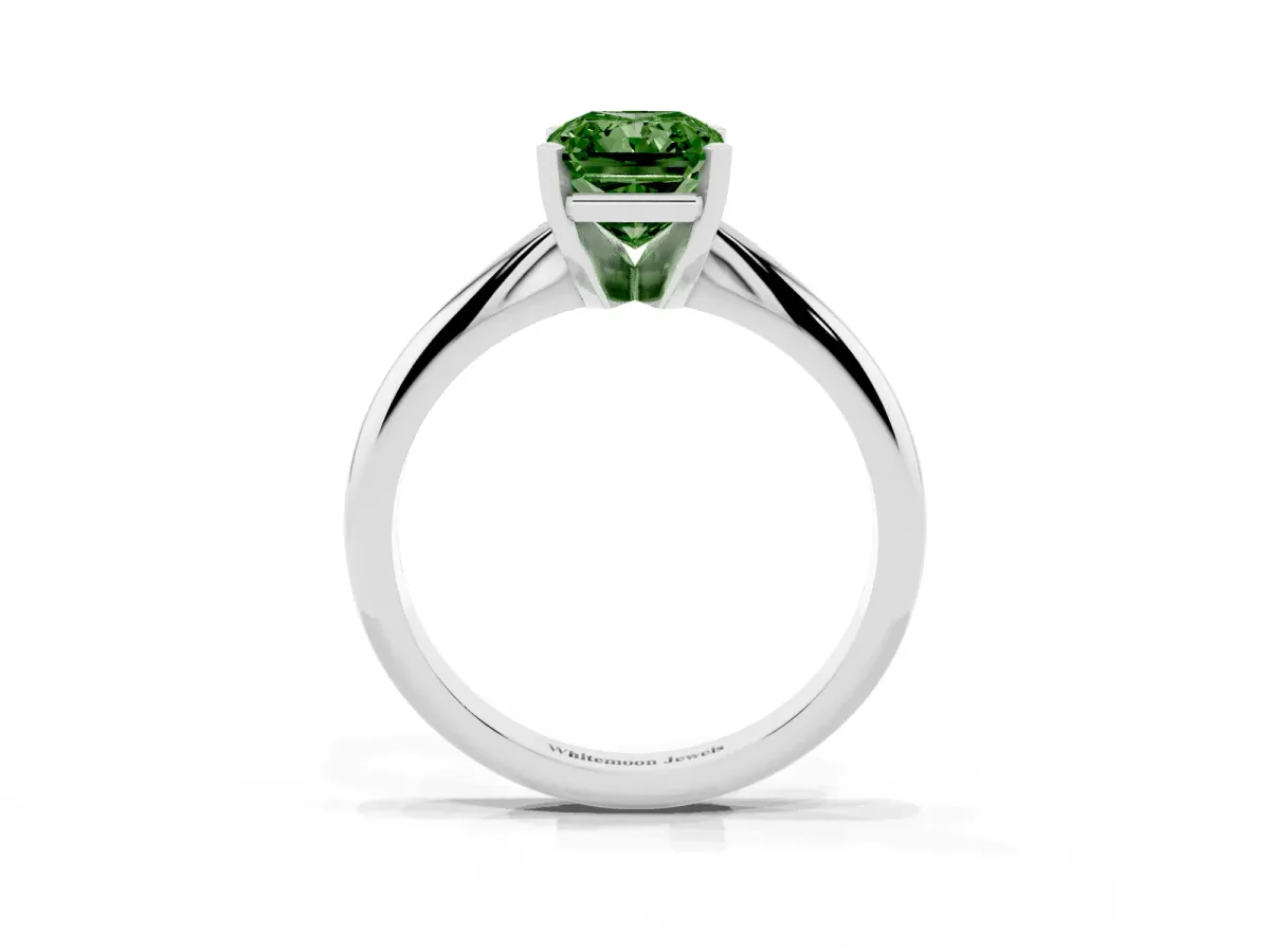 Fancy Green Radiant Cut Cut Solitaire Ring with Four-Prong Setting on a Classic Band Silver