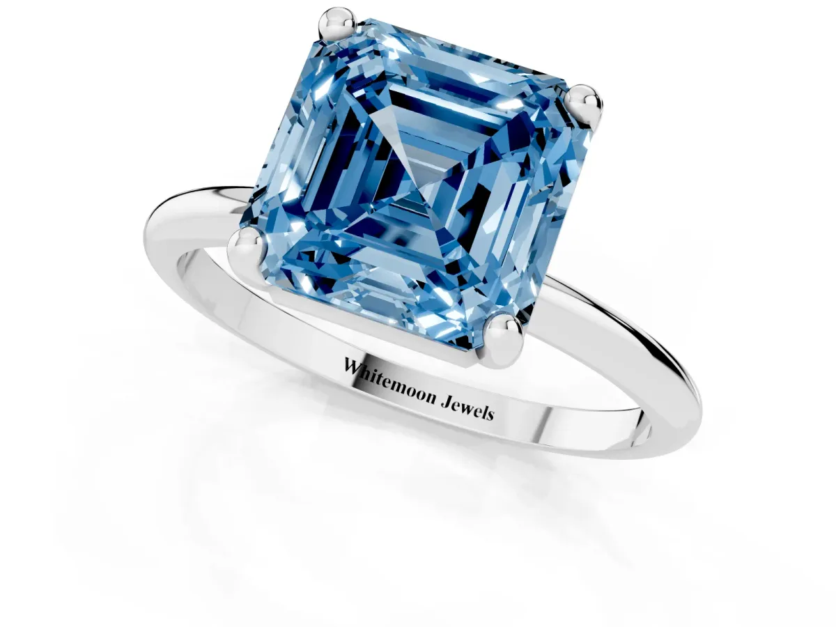 Fancy Blue Asscher Cut Solitaire Diamond Ring with 4-Prong Setting on a Classic Band Silver