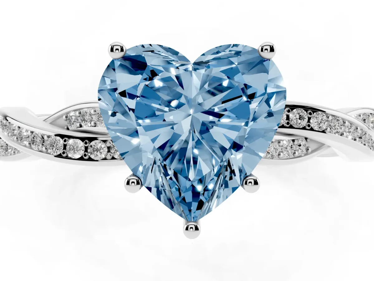 Fancy Blue Heart Cut Solitaire Twisted Pave Diamond Ring with Four-Prong Setting Silver
