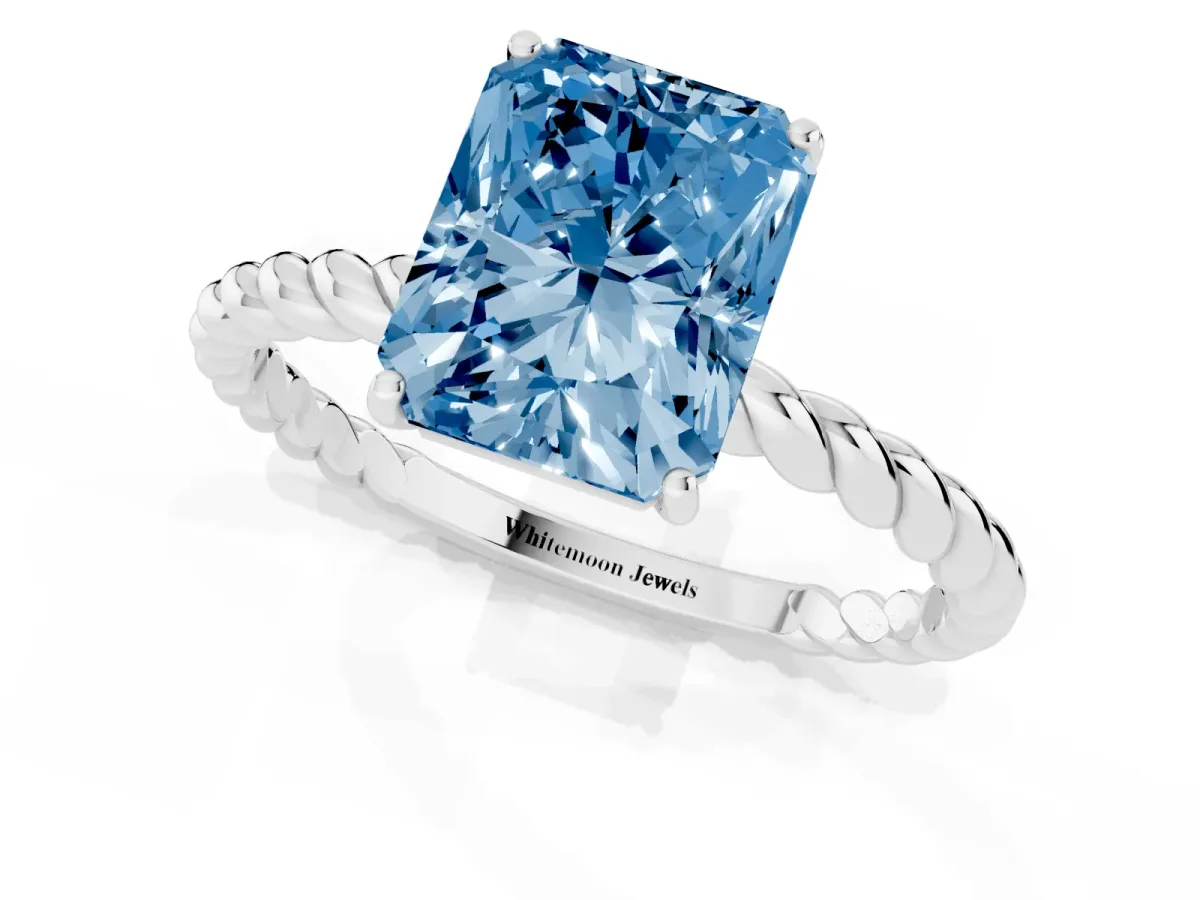 Fancy Blue Radiant Cut Solitaire Twist Band Ring with Four-Prong Setting Silver