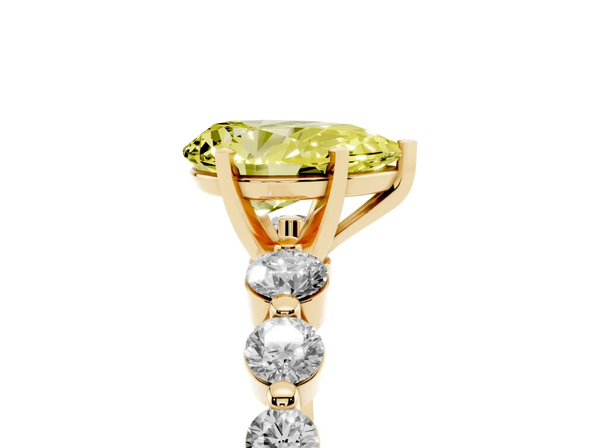 Fancy Yellow Pear Cut Solitaire Diamond Ring with Pave Band and Four-Prong Setting Yellow gold