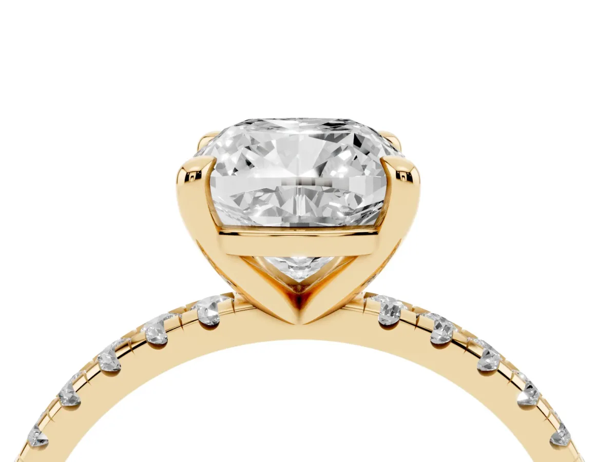 Cushion Cut Diamond Brilliant Solitaire Ring with Pavé Band and Four-Prong Setting Yellow gold