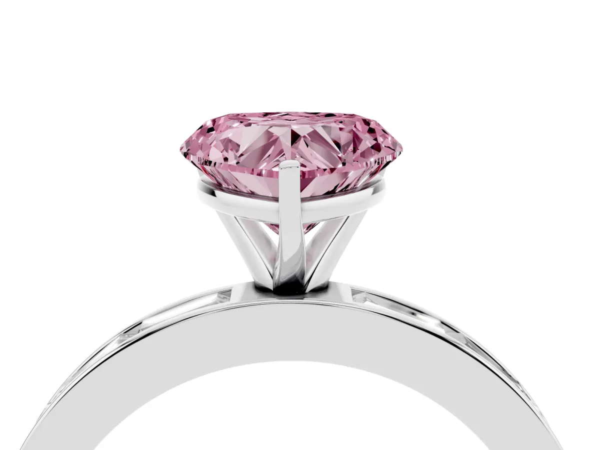 Fancy Pink Heart Cut Solitaire Diamond Ring with Channel-Set Baguette Band and Four-Prong Setting Platinum