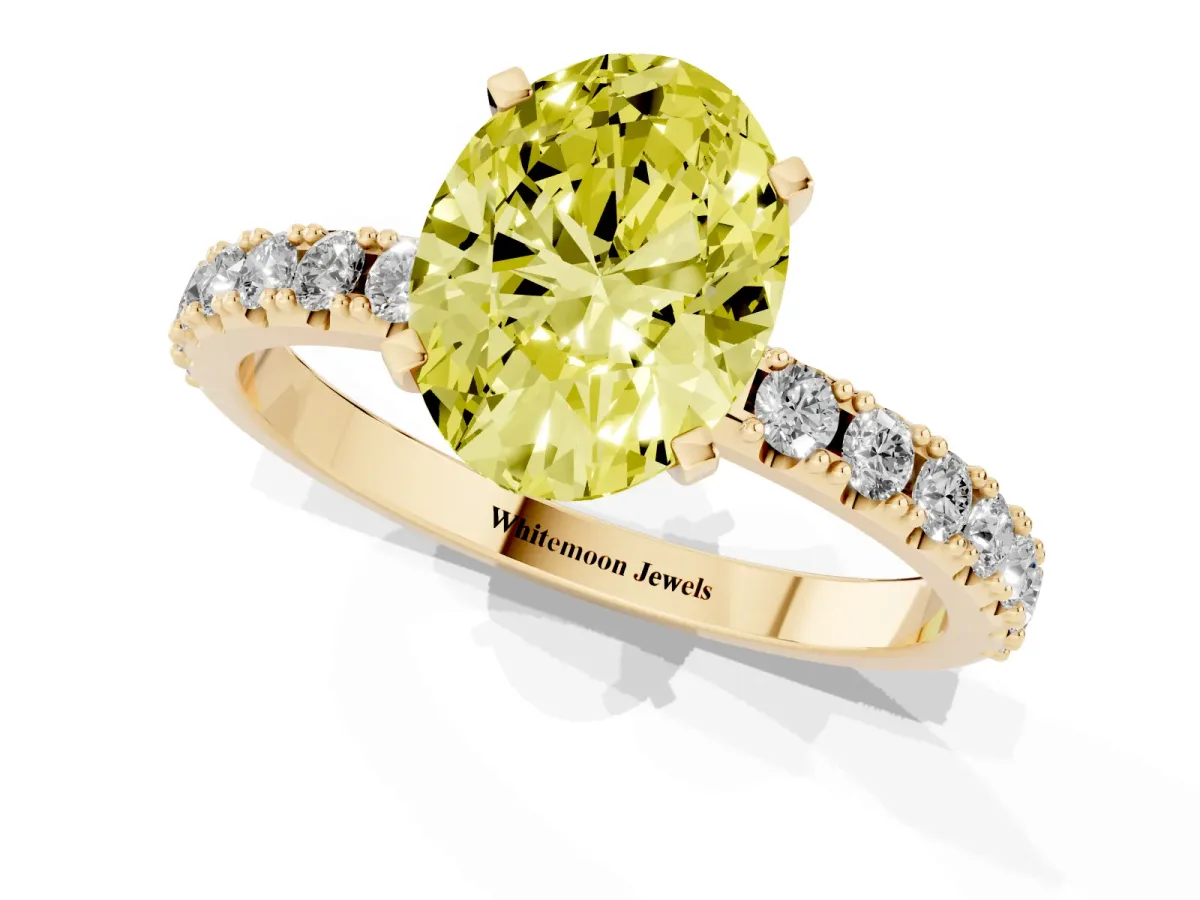 Fancy Yellow Oval Cut Diamond Solitaire Pavé Band with Four-Prong Setting Yellow gold