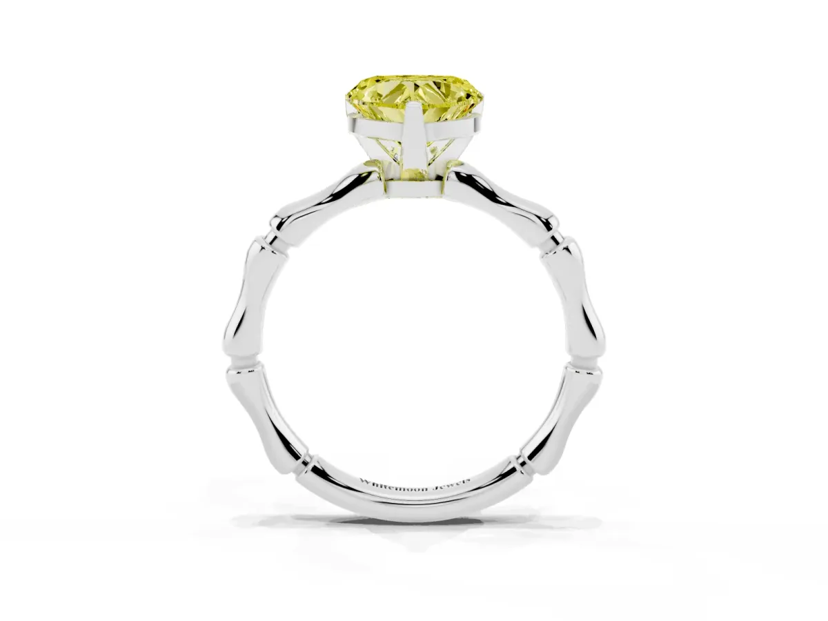 Fancy Yellow Heart Cut Solitaire Diamond Ring with Bamboo Band and Four-Prong Setting Silver
