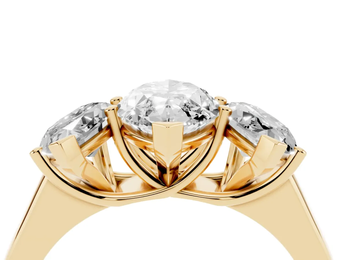 Marquise Cut Three-Stone Diamond Ring with Prong Setting on a Classic Band Yellow gold