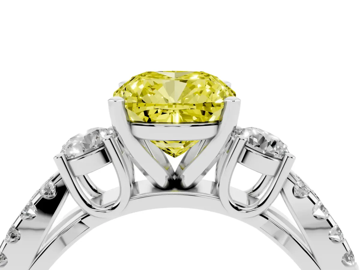 Fancy Yellow Cushion Cut Diamond Three-Stone Ring with Pavé Split Shank and Four-Prong Setting Platinum