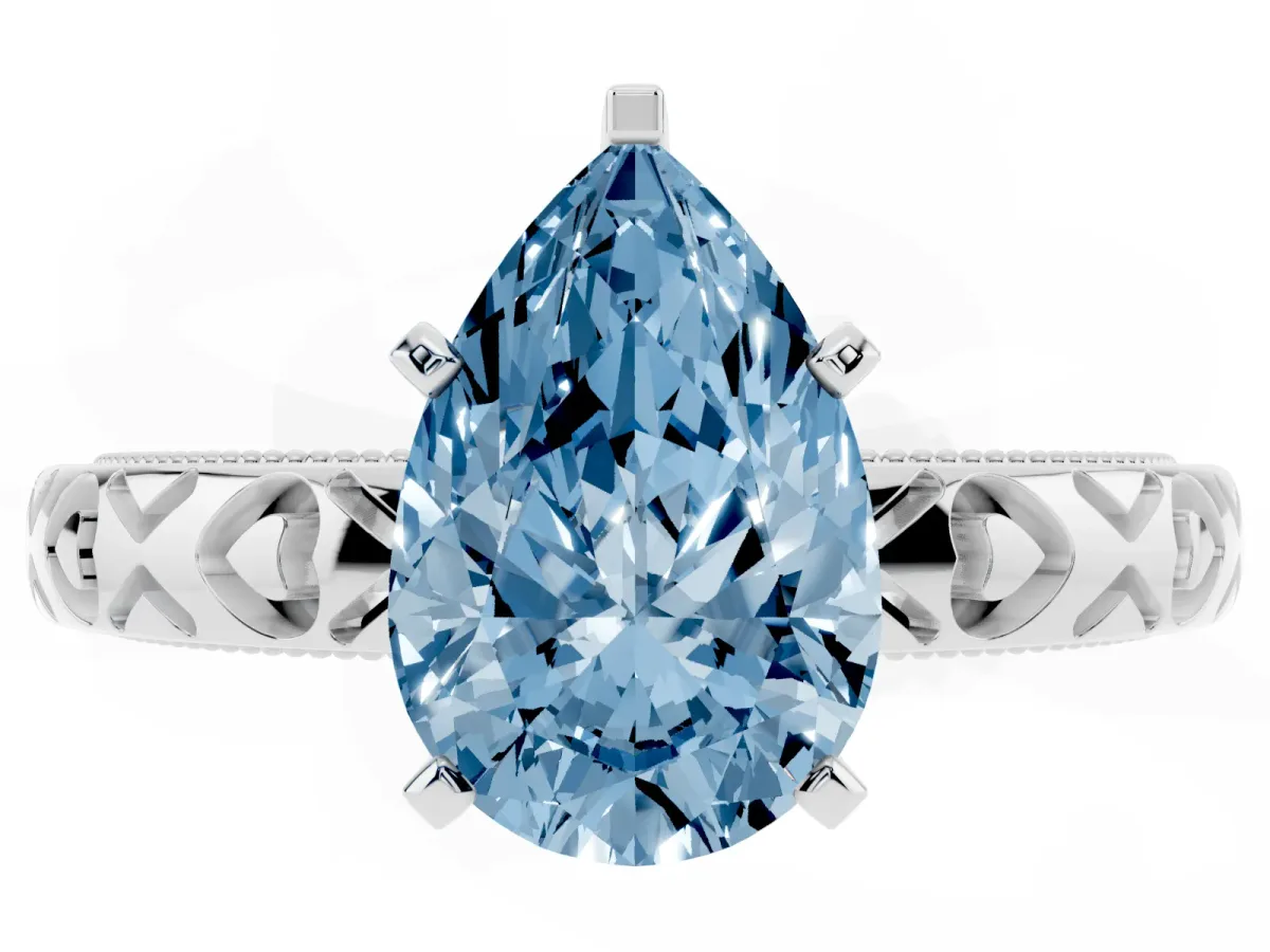 Fancy Blue Pear Cut Solitaire Diamond Engagement Ring with XO Engraved Band and Four-Prong Setting White gold