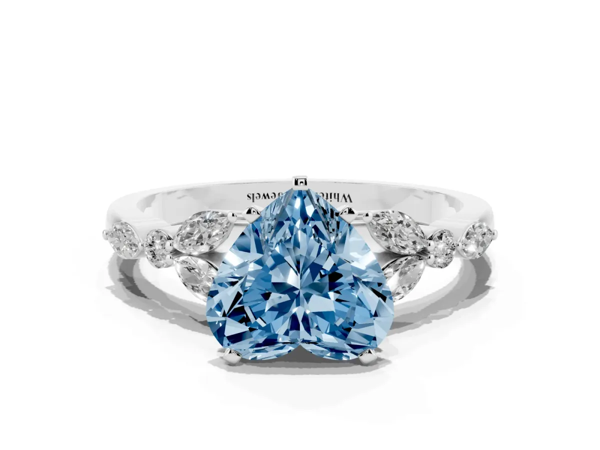 Fancy Blue Heart Cut Diamond Solitaire Ring with Side Stones and Four-Prong Setting Platinum