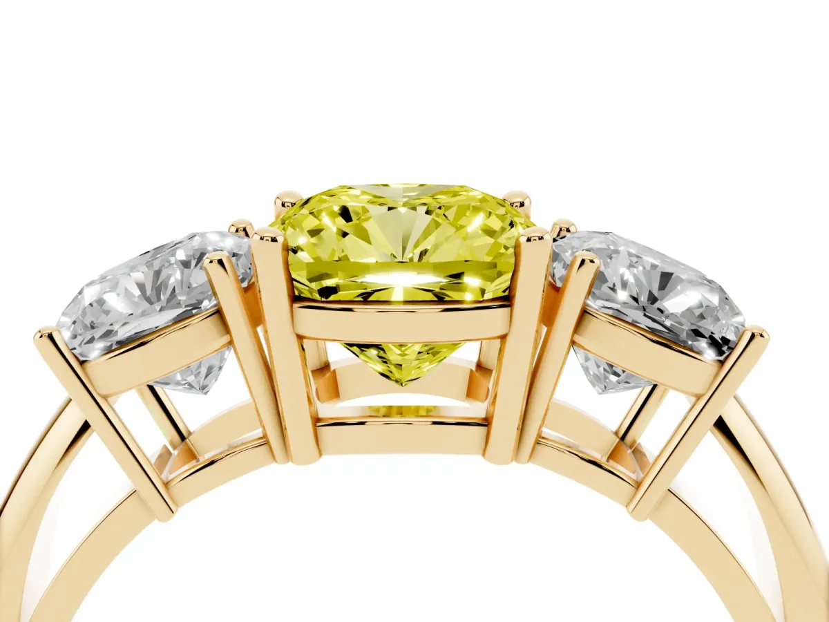 Fancy Yellow Three-Stone Cushion Cut Cut Diamond Engagement Ring with Prong Setting on a White Gold Band Yellow gold