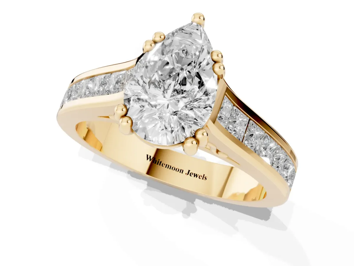 Pear Cut Cut Channel Set Solitaire Engagement Ring with Prong Setting Yellow gold