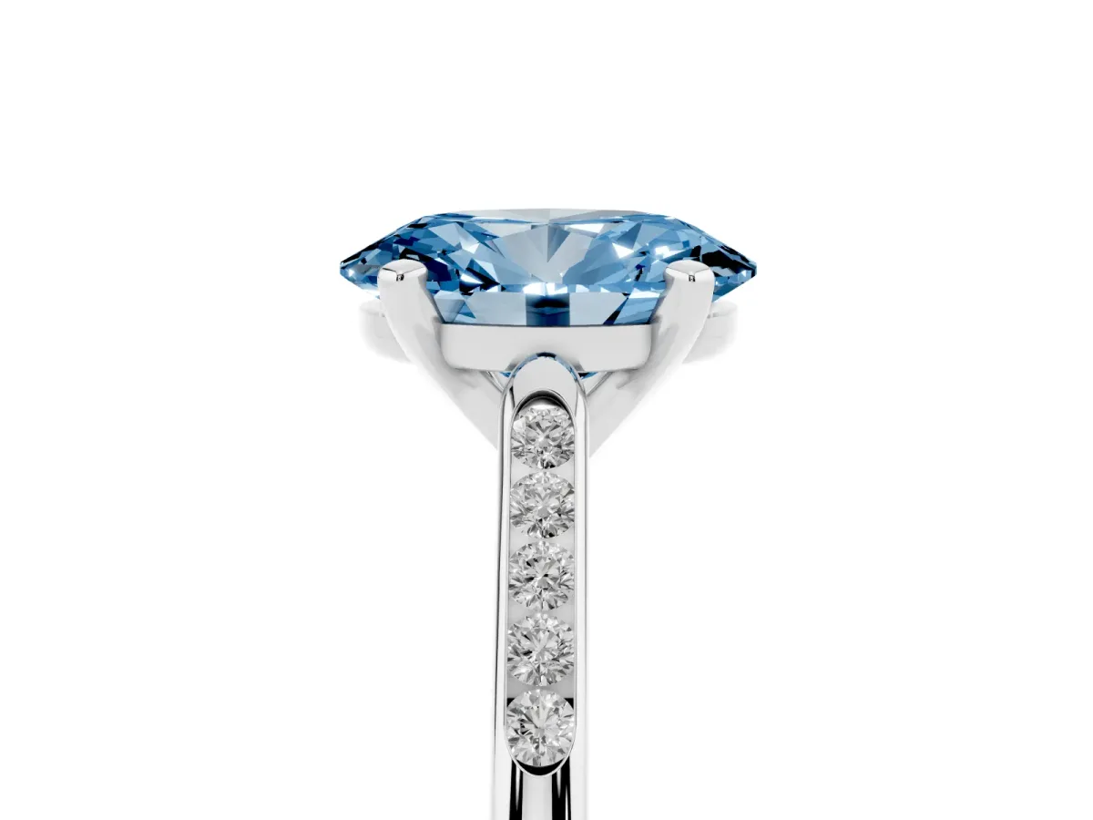 Fancy Blue Oval Cut Diamond Solitaire Ring with Channel Set Round Band and Prong Setting Silver