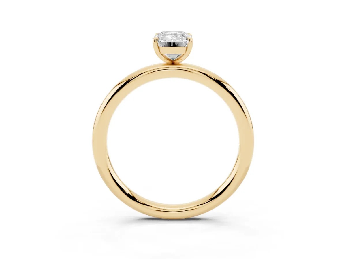 Emerald Cut Solitaire Diamond Ring with Four-Prong Setting on a Plain Band Yellow gold
