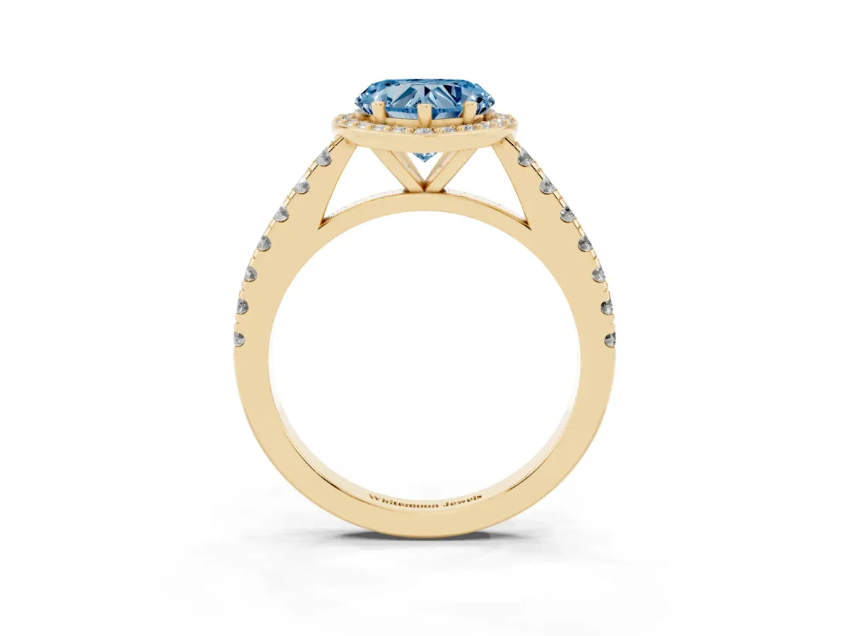 Fancy Blue Heart Cut Cut Halo Diamond Engagement Ring with Pave Band and Four-Prong Setting Yellow gold