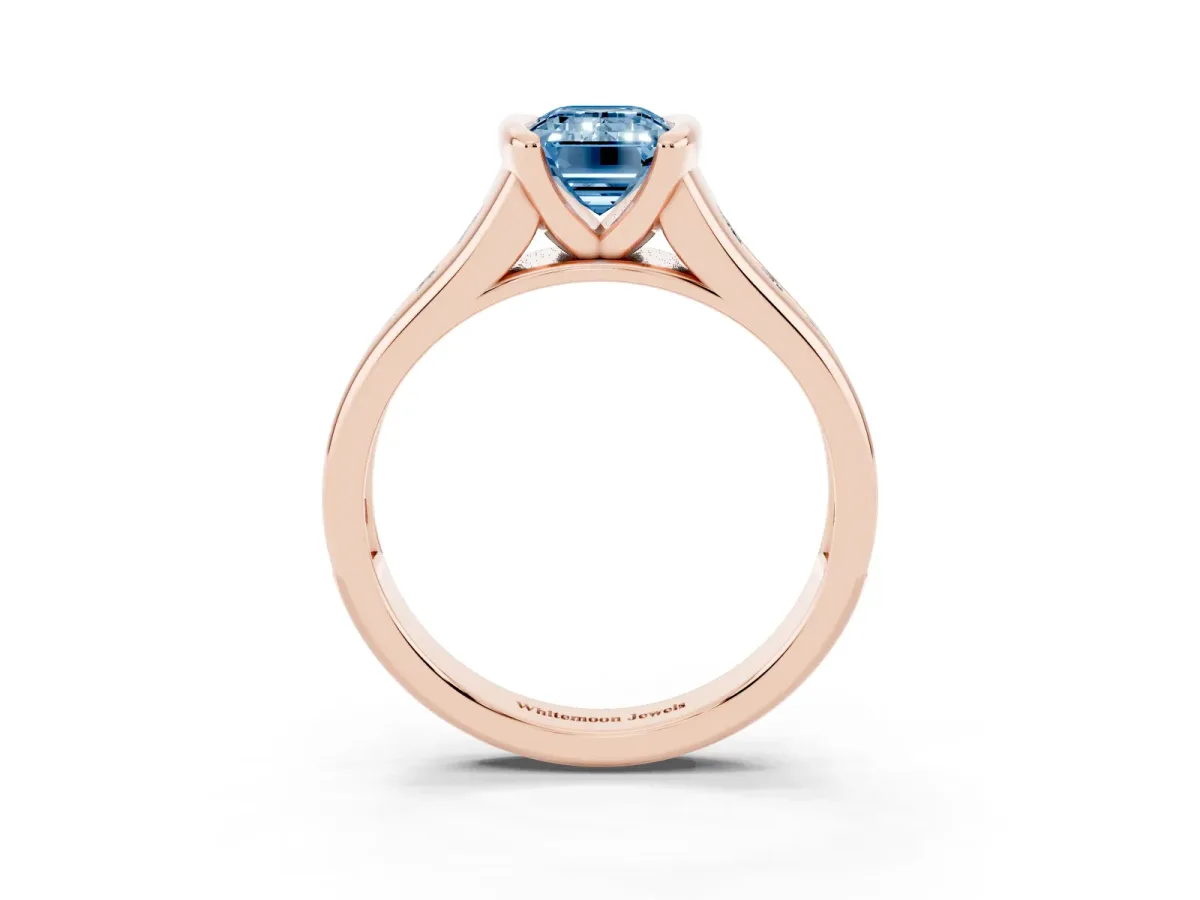 Fancy Blue Emerald Cut Solitaire Bezel-Set Diamond Ring with Channel-Set Band Rose gold