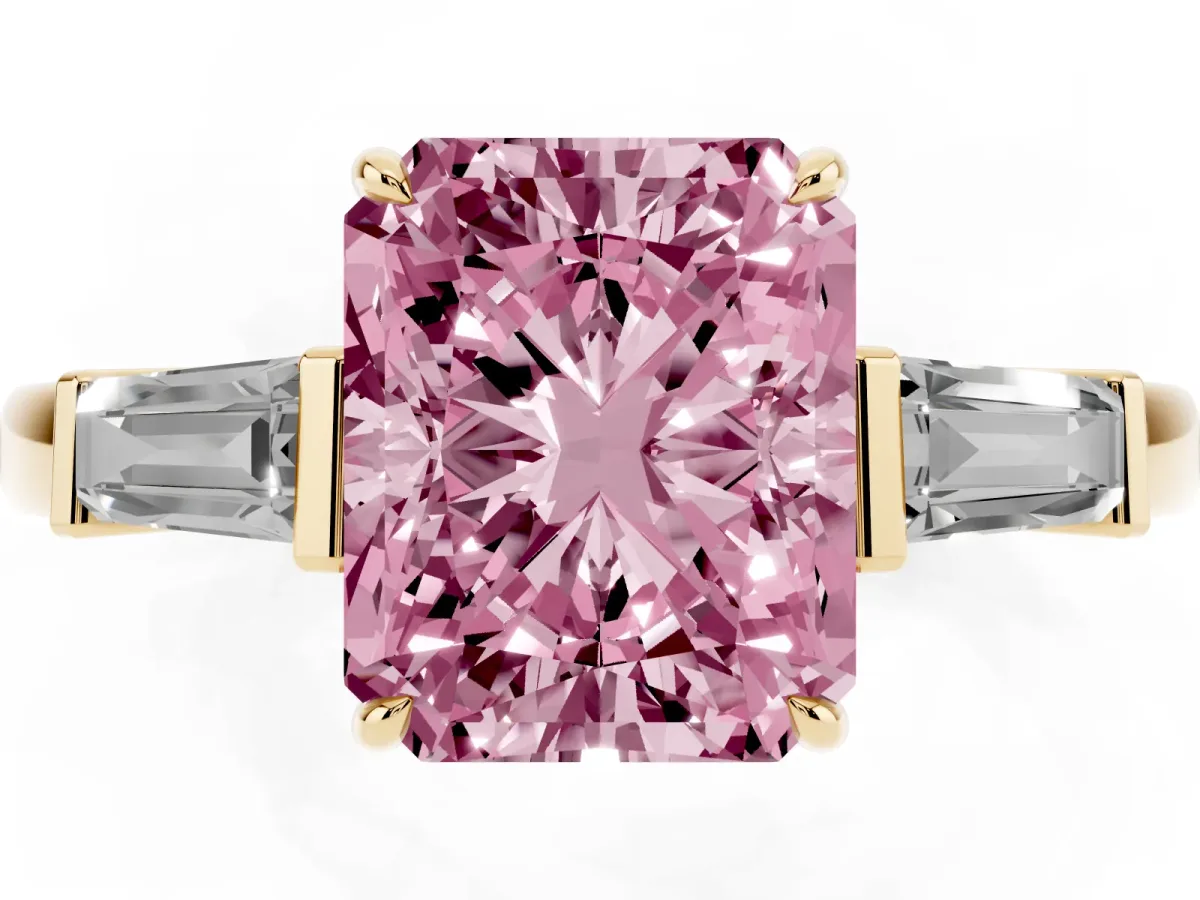 Fancy Pink Radiant Cut Diamond Three-Stone Ring with Tapered Baguette Side Stones and Prong Setting Yellow gold