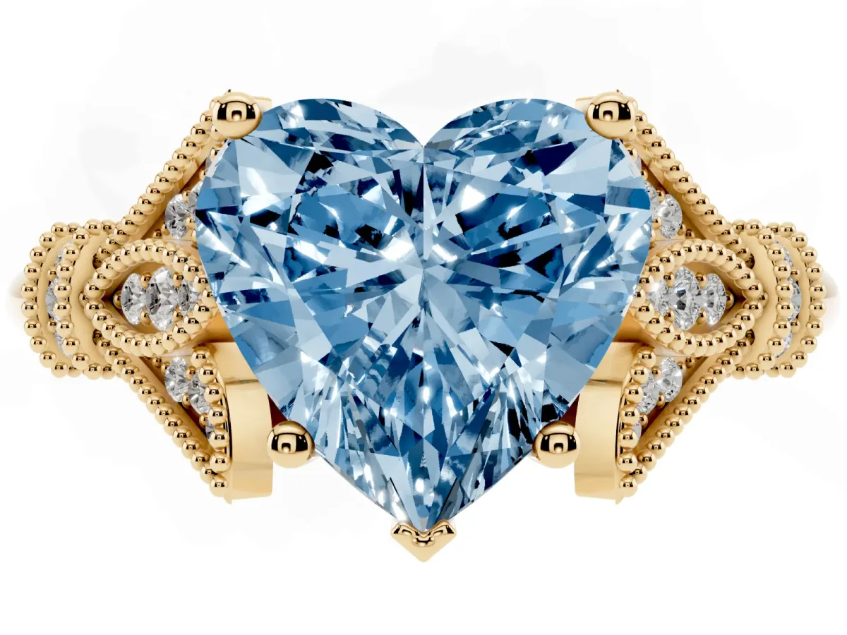 Fancy Blue Heart Cut Diamond Solitaire Ring with Floral Filigree and Pave Accents Yellow gold