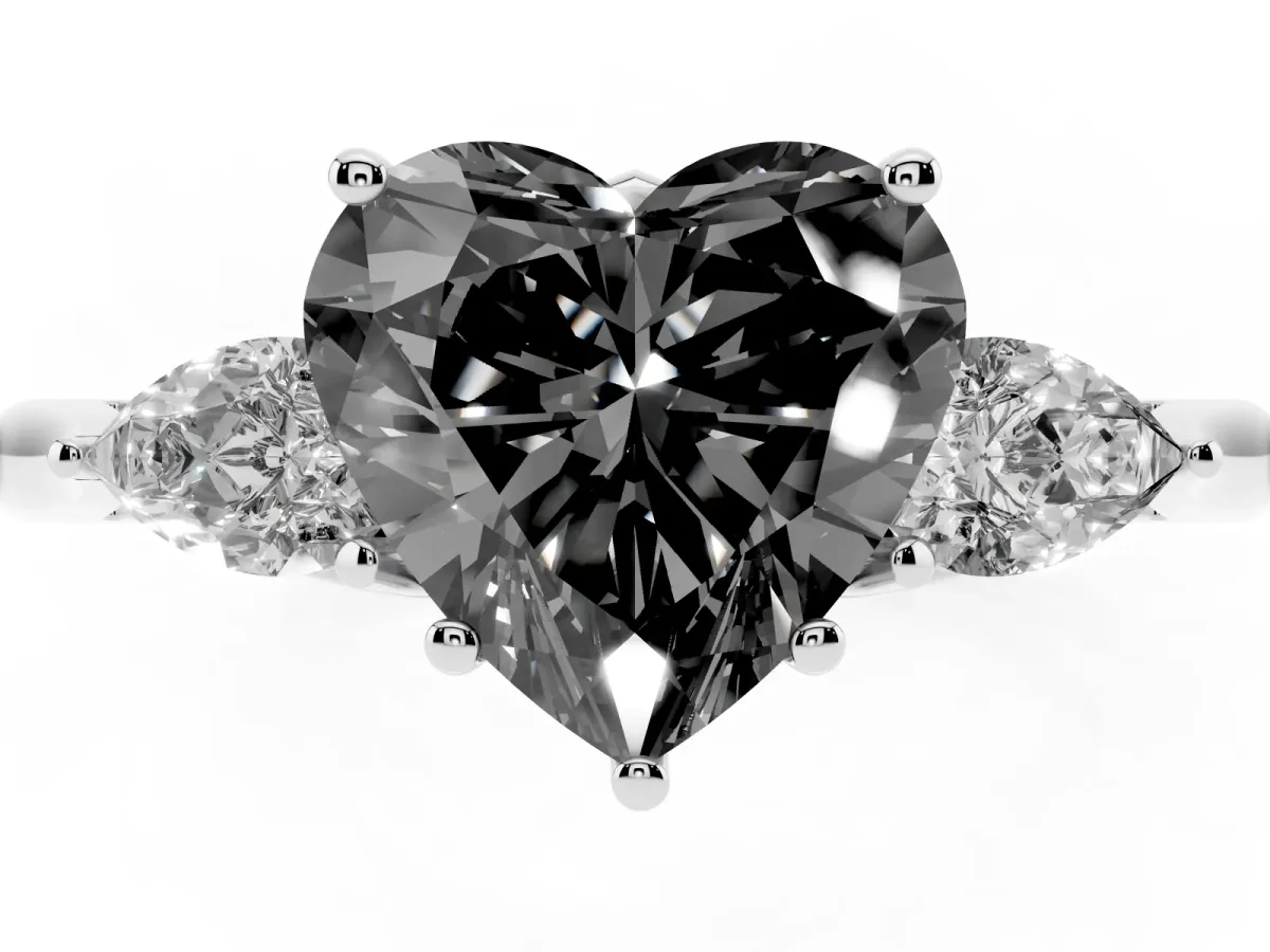 Fancy Black Three-Stone Heart Cut Brilliant Diamond Solitaire Ring with Tapered Band and Four-Prong Setting Silver