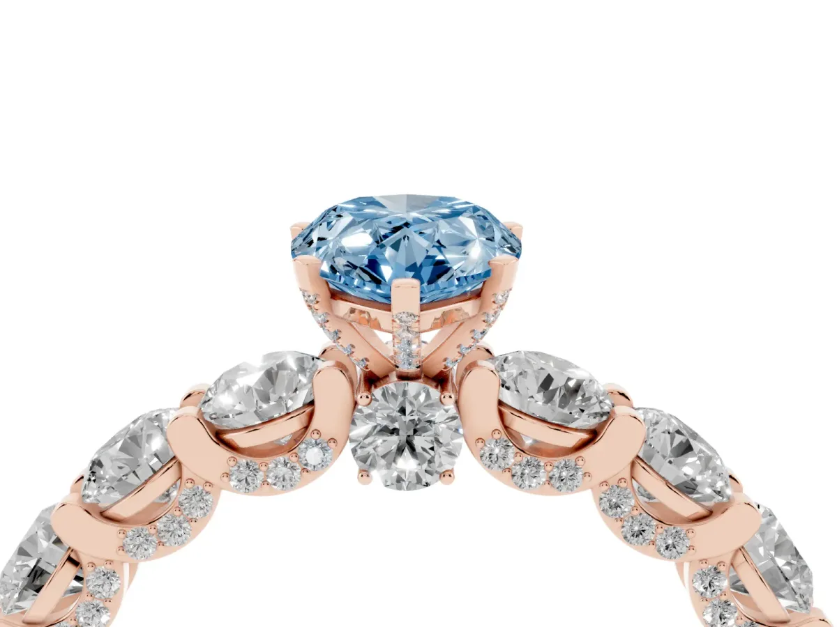 Fancy Blue Pear Cut Diamond Side Stone Engagement Ring with Four-Prong Setting Rose gold