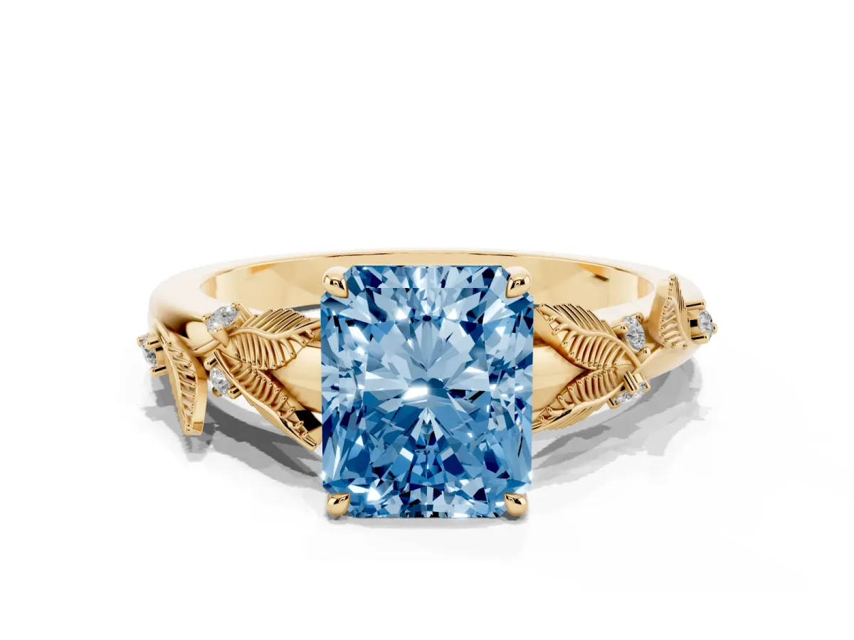Fancy Blue Radiant Cut Diamond Solitaire Ring with Leaf Motif Band and Four-Prong Setting Yellow gold