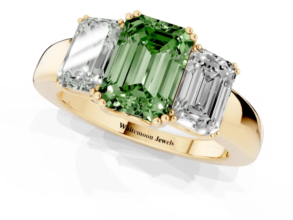 Fancy Green Three-Stone Emerald Cut Cut Diamond Ring with Channel Set Band and Four-Prong Setting Yellow gold