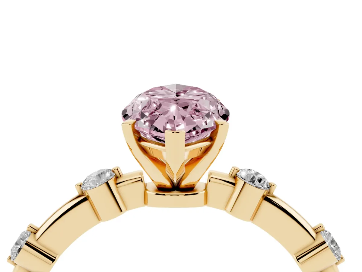 Fancy Pink Marquise Cut Solitaire Diamond Ring with Bezel Set Side Stones and Prong Setting Yellow gold